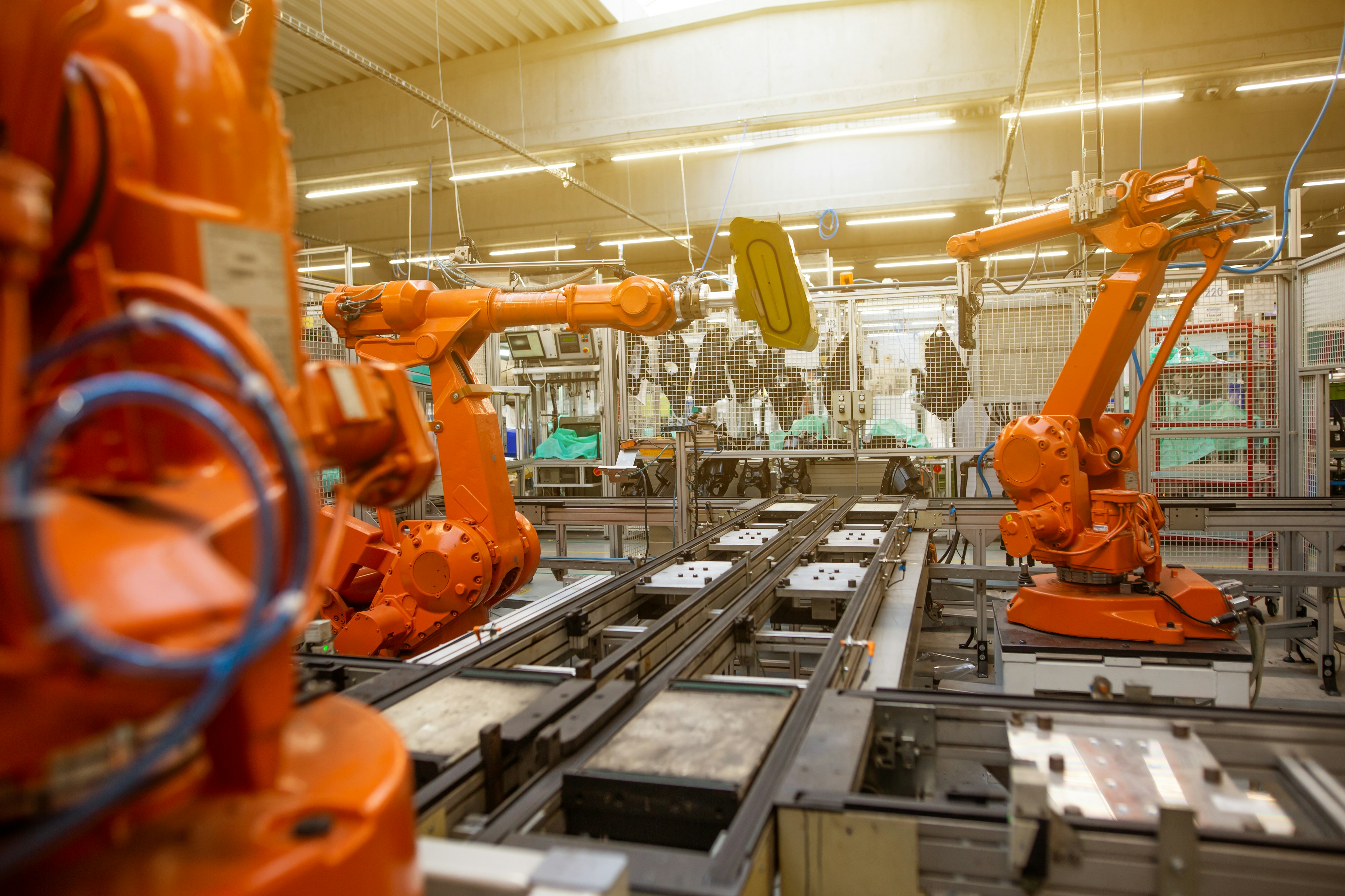 Automatic robots in the industrial factory for assembly automotive products, automotive conceptby Simon Kadula